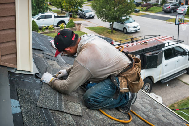 Professional Gutter Repair And Installation technician working in Hopwood, PA